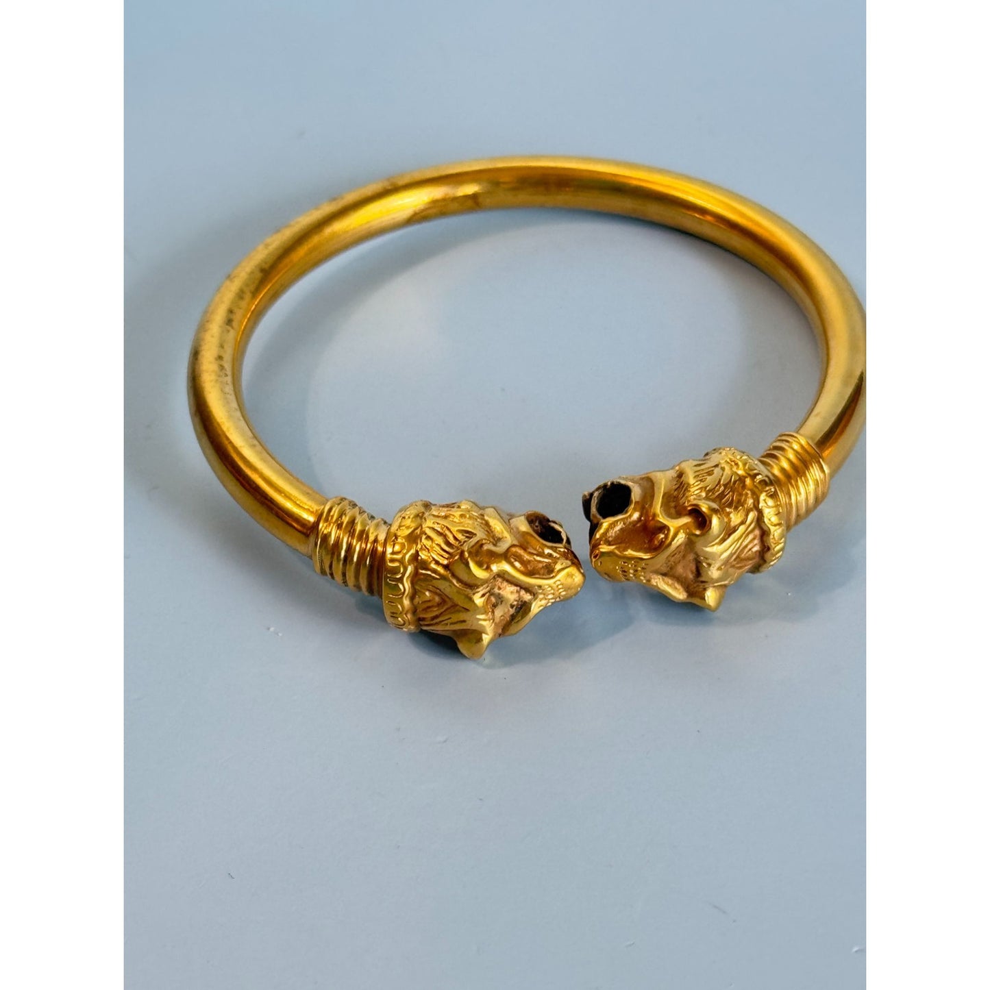 Gold-Toned Lion Head Cuff Bracelet With Intricate Detailing 7"
