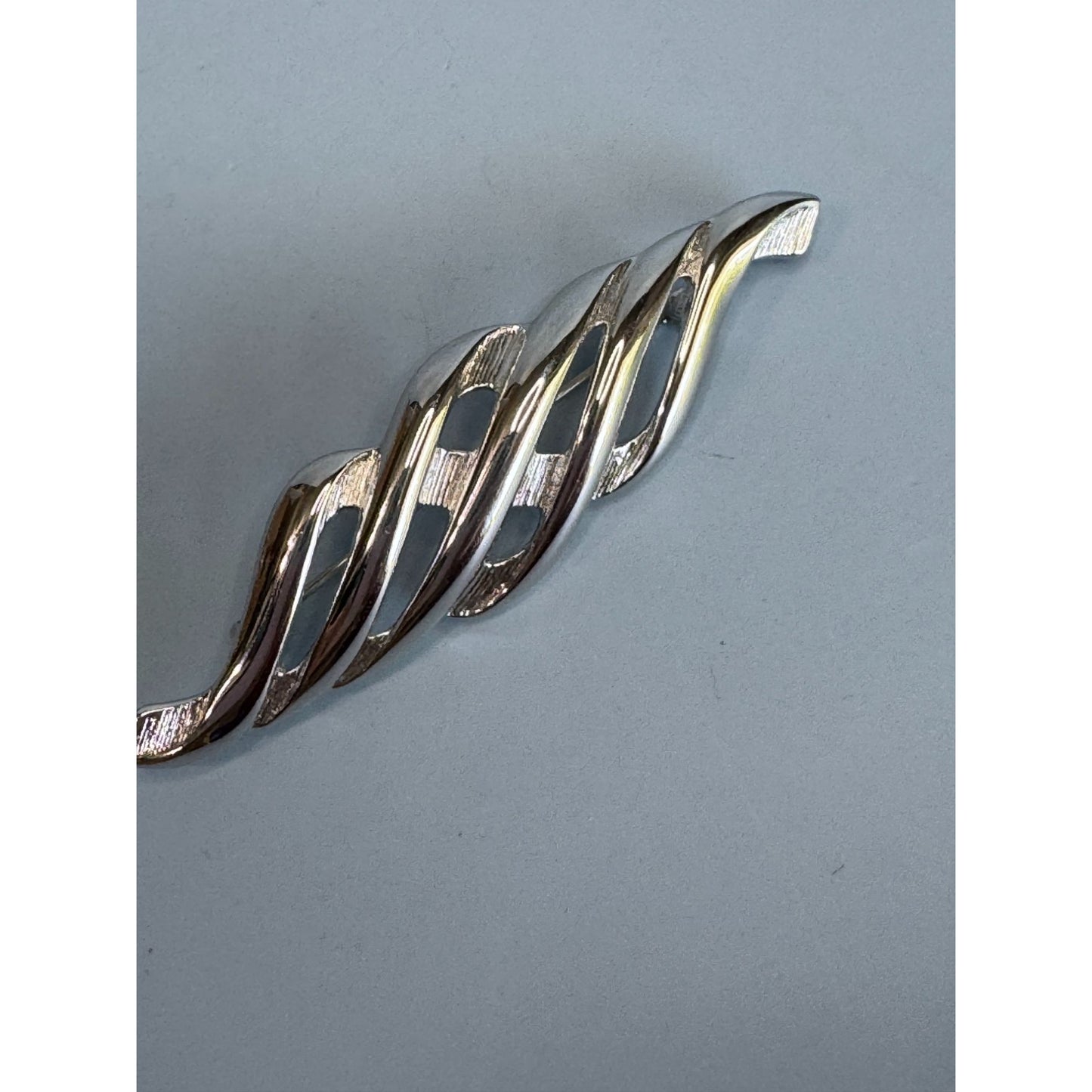 Monet Silver-Tone Twisted Wave Brooch Classic Designer Signed Jewelry Piece