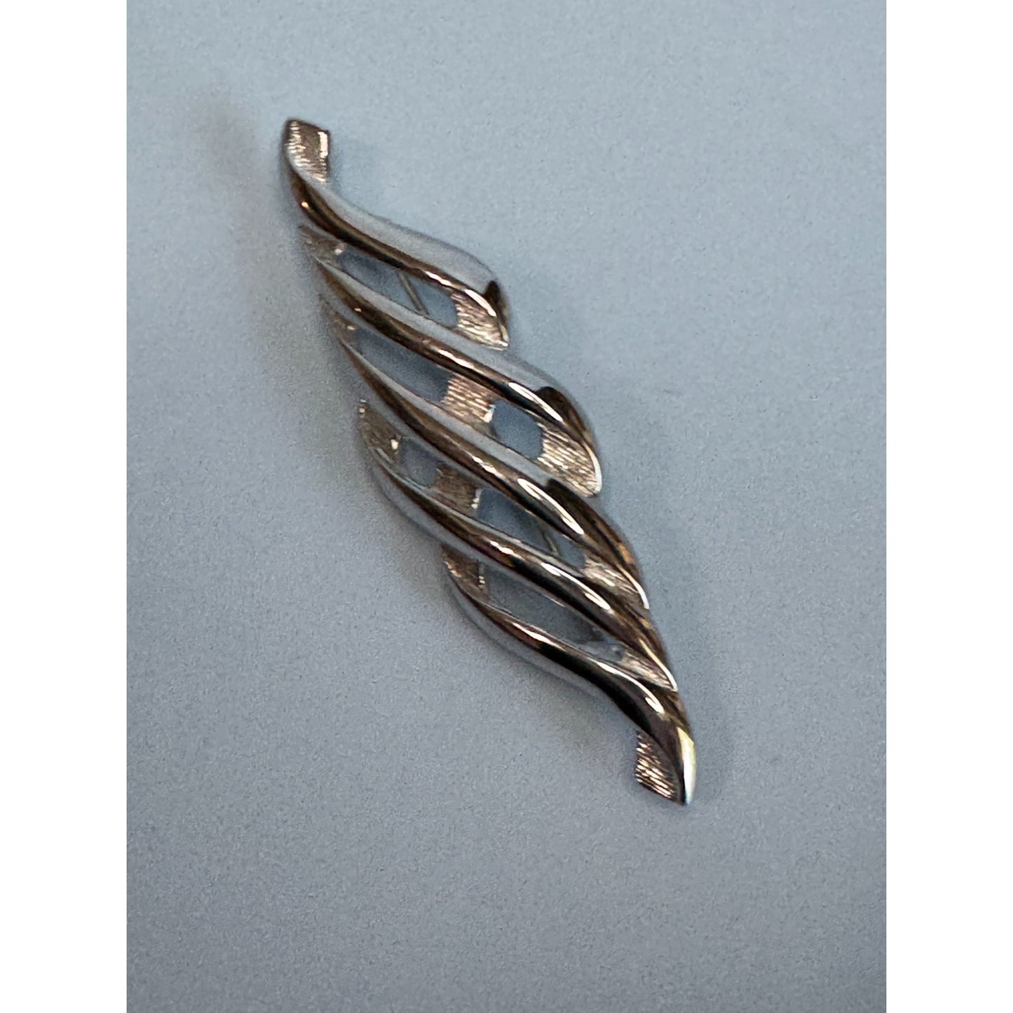 Monet Silver-Tone Twisted Wave Brooch Classic Designer Signed Jewelry Piece