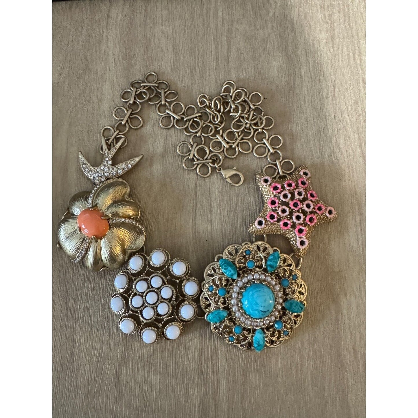 Stella and Dot Faux Turquoise Coral Goldplate Starfish Bird Flower Necklace