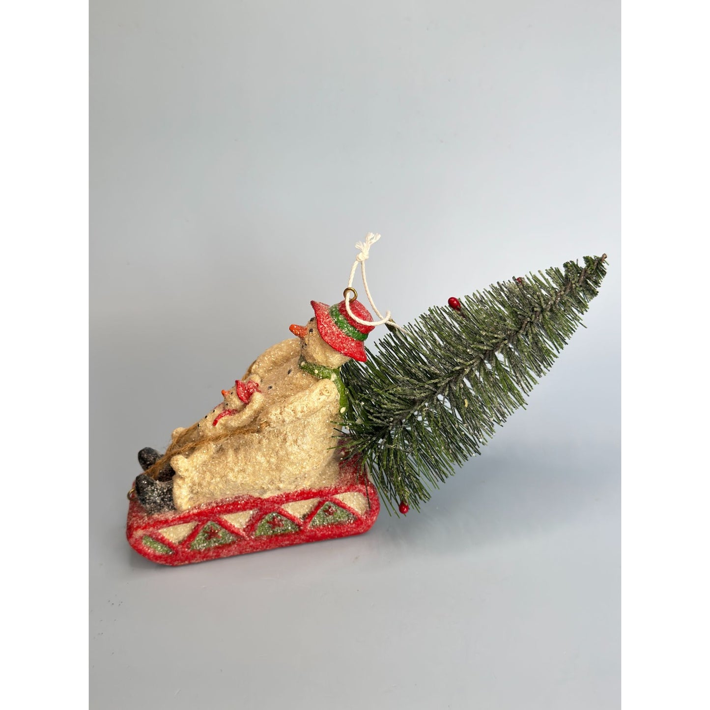 Snowman & Snowchild Sledding with Bottle Brush Christmas Tree Ornament