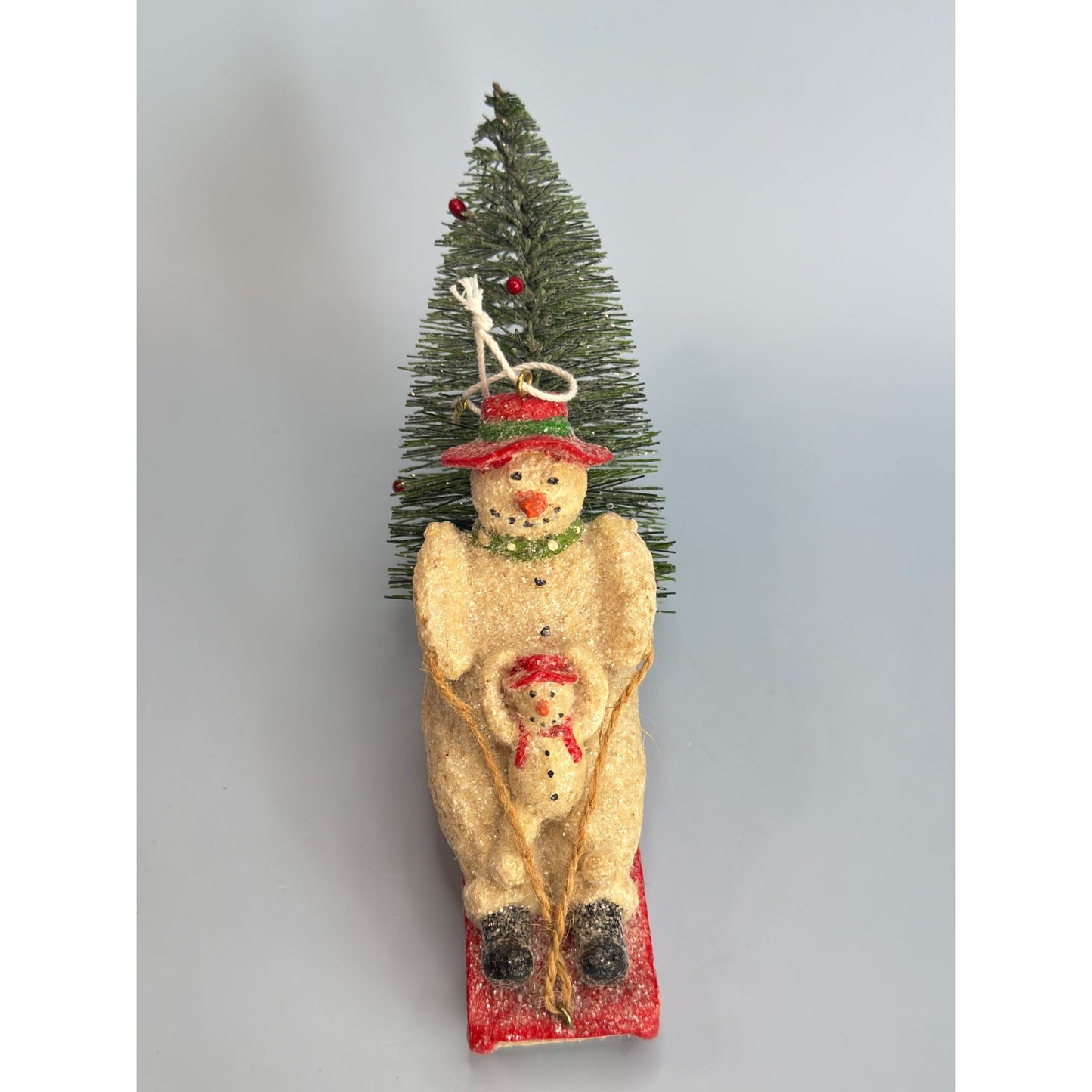 Snowman & Snowchild Sledding with Bottle Brush Christmas Tree Ornament