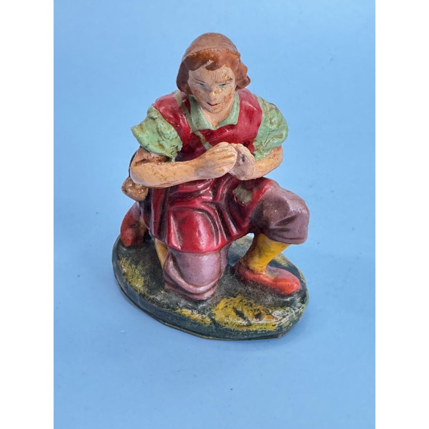 Vintage Italian Paper Mache Figurine Of Kneeling Boy with Horn In Red Outfit