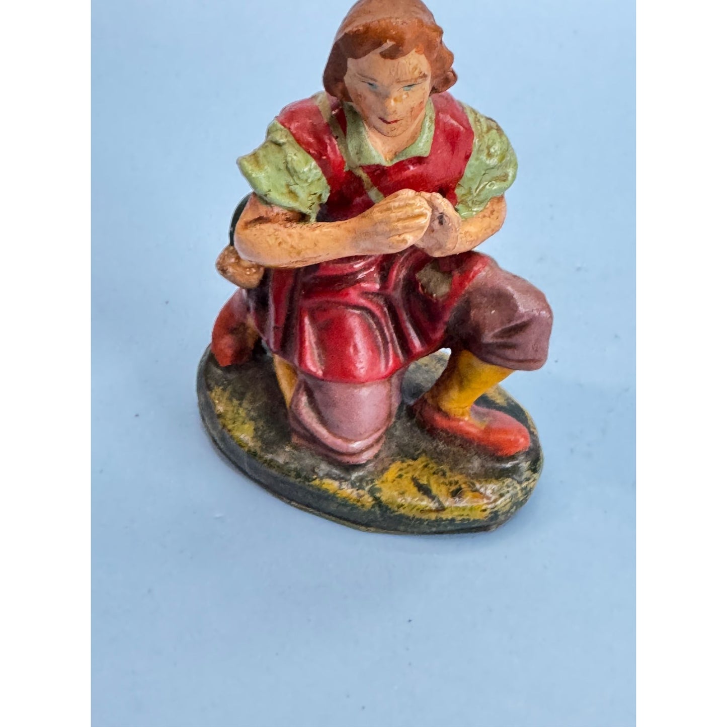 Vintage Italian Paper Mache Figurine Of Kneeling Boy with Horn In Red Outfit