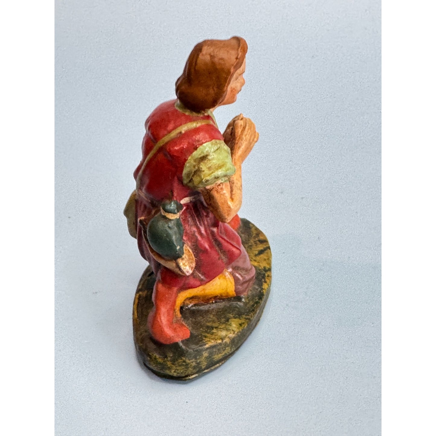Vintage Italian Paper Mache Figurine Of Kneeling Boy with Horn In Red Outfit