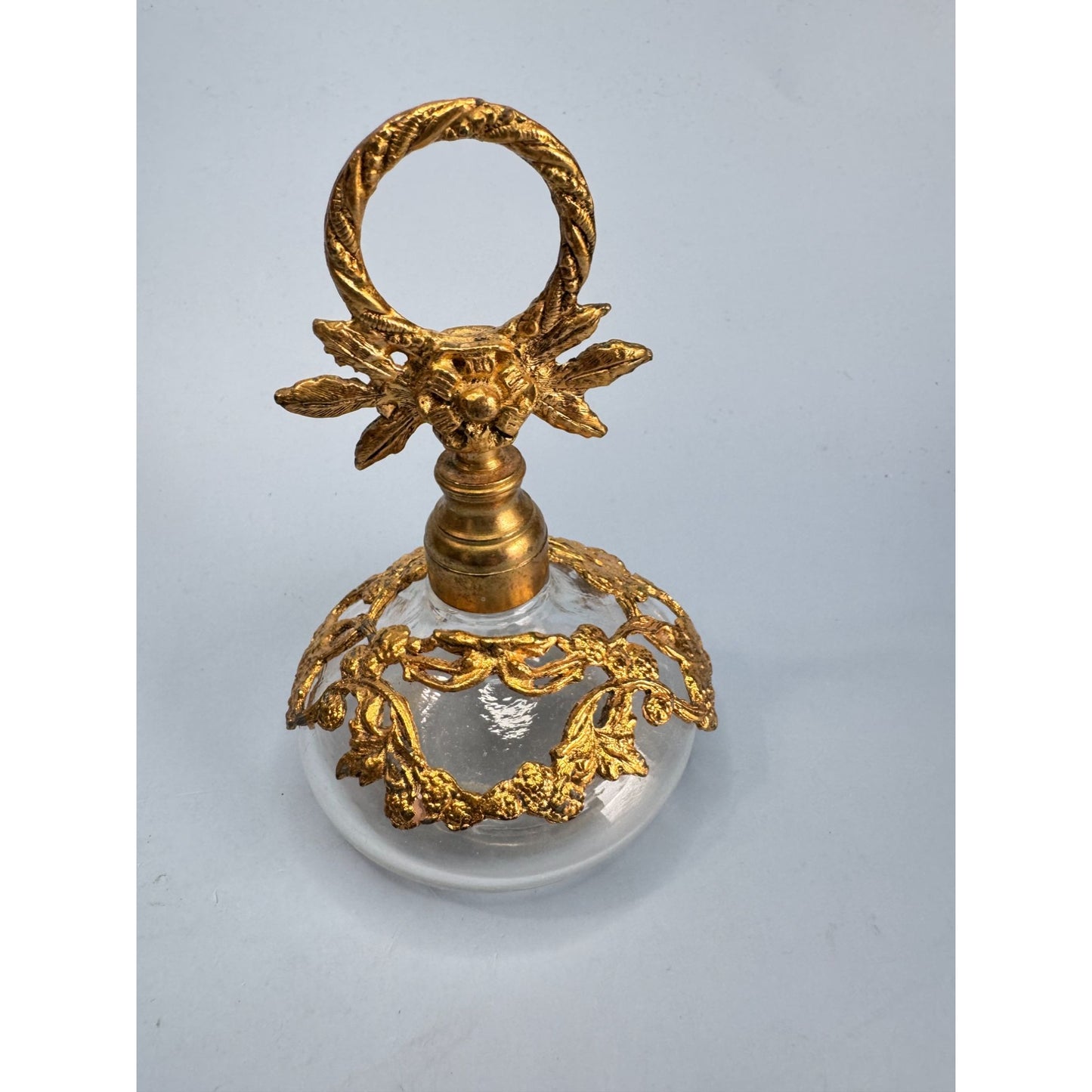 Antique German Gold Gilded Clear Glass Perfume Bottle With Ornate Floral Design & Stopper