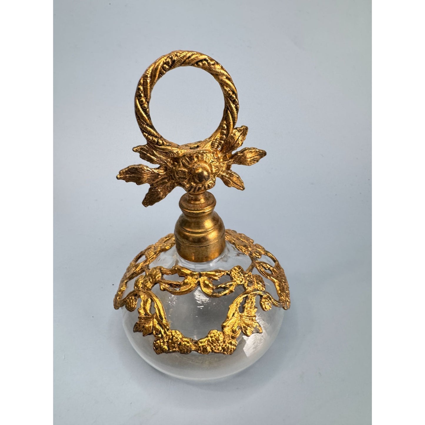 Antique German Gold Gilded Clear Glass Perfume Bottle With Ornate Floral Design & Stopper