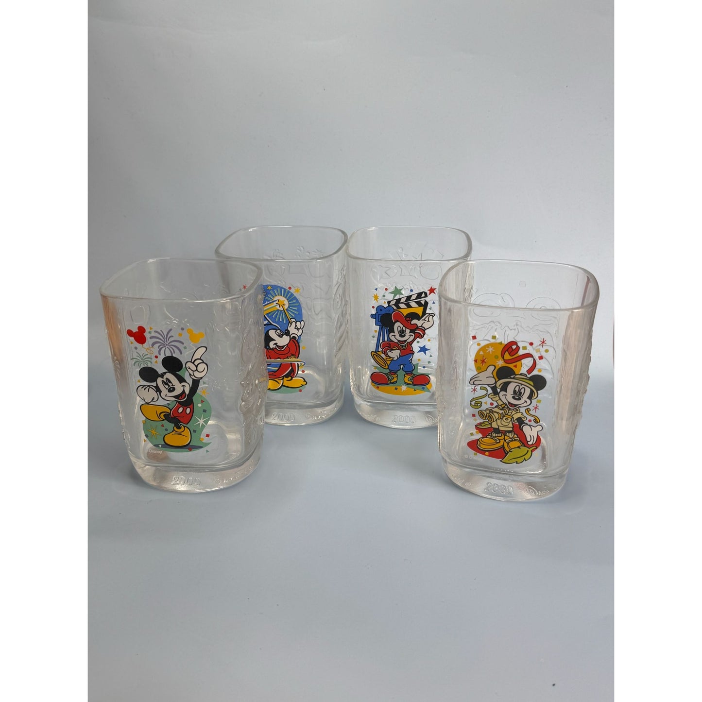 Walt Disney World 2000 millenium Mickey Mouse Collectible Glass Tumblers Set Of 4