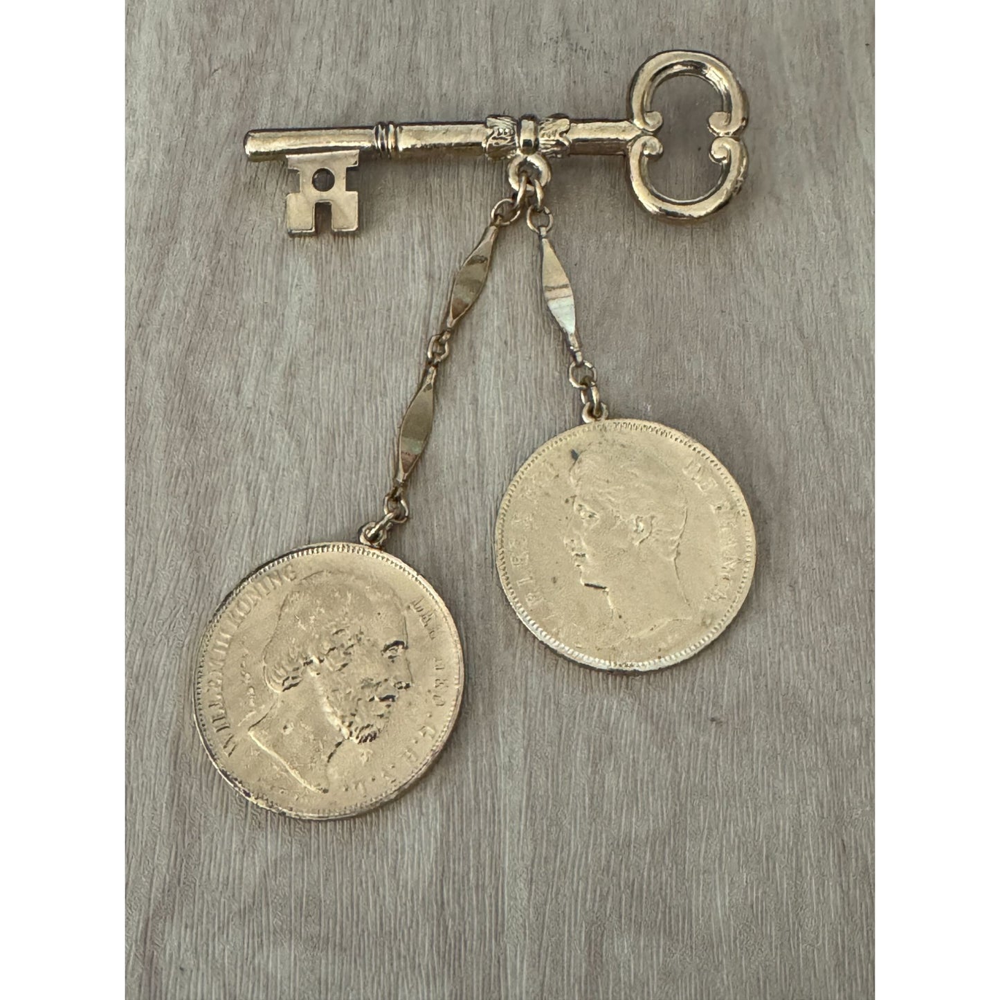 Vintage Gold-Toned Key Brooch With Dangling Coin Charms Intricate Details Retro