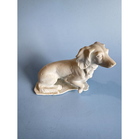 Vintage Kaiser Porcelain Figurine Of A Sitting Dog  Handcrafted White Ceramic Decor 3 3/4" x 3 1/2"