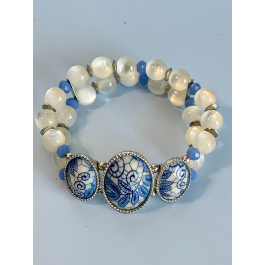 Blue Ice Glass Beaded Stretch Bracelet With Floral Embossed Porcelain Accents